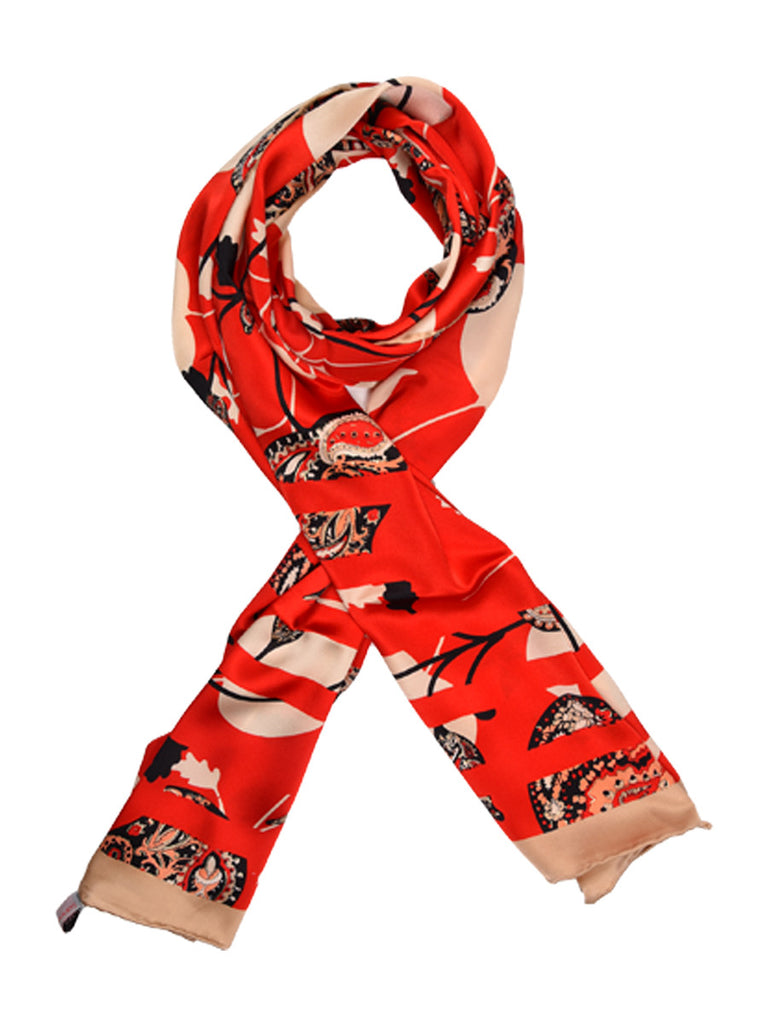 Red silk scarf hosting nature inspired leaves design