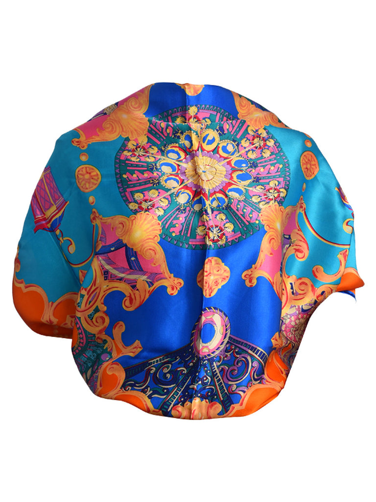 Orange and blue silk scarf with an arabian theme design